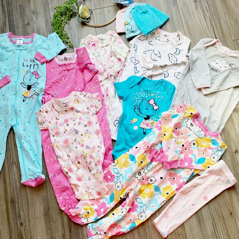 Baby girl onesies, sleeping gowns and hat set by Gerber. Small stain on 2 items.